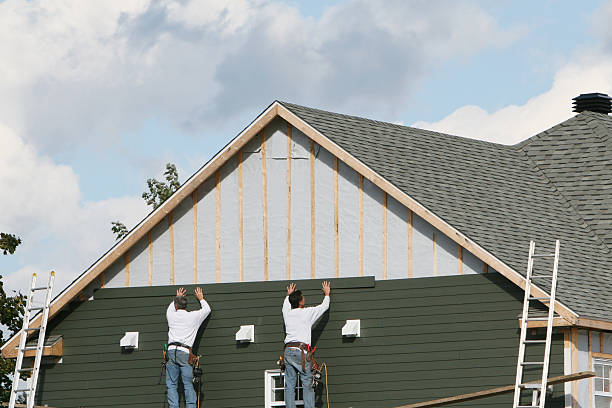 Professional Siding Installation technician working in Tipp City, OH